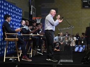 Los Angeles Clippers' owner Steve Ballmer claps during his NBA team's introductory news conference of Kawhi Leonard and Paul George at Green Meadows Recreation Center on July 24 in Los Angeles.