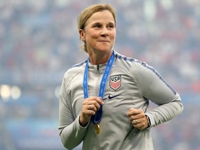 United States women's soccer team head coach Jill Ellis celebrates after her team's victory over the Netherlands in the World Cup final at Stade de Lyon on July 07, 2019 in Lyon, France.