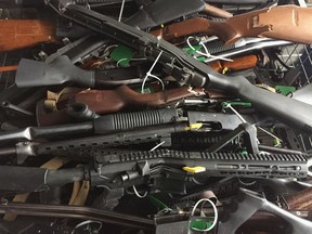 In this handout image provided by New Zealand Police, collected firearms are seen at Riccarton Racecourse on July 13, 2019 in Christchurch, New Zealand. It is the first firearms collection event to be held in New Zealand following changes to gun laws, providing firearms owners the initial opportunity of many to hand-in prohibited firearms for buy-back and amnesty. The Christchurch event is one of 258 events that will run across the country over the next three months.The NZ Government will pay owners between 25 per cent and 95 per cent of a set base price, depending on condition. It will also compensate dealers and pay for some weapons to be modified to make them legal. The amnesty ends on December 20.
