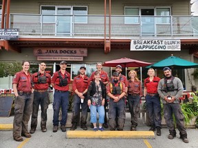 Shelley Wharton, centre, whipped up breakfast for 40 when fire crews arrived to fight the Cecil Hill fire on the Sunshine Coast last week.