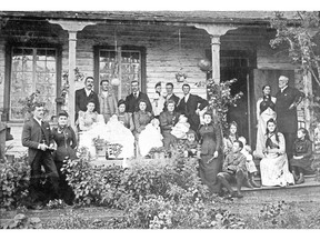 Three generations of the Pauline family pose for a photo around 1890 in front of Tod House, the family home on Oak Bay's Heron Street. About 60 descendants of Frederick and Mary Pauline, pictured standing at far right, are gathering in Victoria this weekend to recreate the photo.