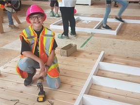 Starting young to build the future, Thompson Rivers University's trades and technology training department staged a carpentry camp for girls on campus where participants ages 12 to 15 helped build a play house for a daycare centre. The idea was to spark interest for a future in carpentry. Photo: Courtesy of Thompson Rivers University.