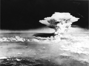 Picture taken Aug. 6, 1945, by U.S. Army and released from Hiroshima Peace Memorial Museum shows mushroom cloud of the atomic bomb dropped by B-29 bomber Enola Gay over the city of Hiroshima, the Japanese city that was consumed by the searing heat of the world's first nuclear attack. About 140,000 people are estimated to have been killed in the attack, including those who survived the bombing itself but died soon afterward due to severe radiation exposure.  (AFP FILES)