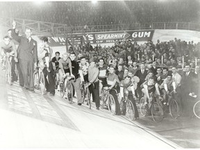 Canadian cycling great William "Torchy" Peden (left) with fellow cyclists before a race. Photo courtesy of the BC Sports Hall of Fame.