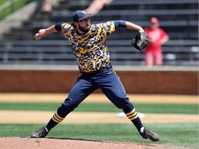 Alek Manoah throws for the West Virginia University Mountaineers. Manoah, the first round draft pick of the Toronto Blue Jays, has been assigned to the Vancouver Canadians. (Photo: Andy Mead/YCJ/Icon Sportswire)