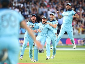 England's Jonny Bairstow, Jos Buttler, Chris Woakes and Liam Plunkett celebrate winning the World Cup after the super over Action Images via Reuters/Peter Cziborra