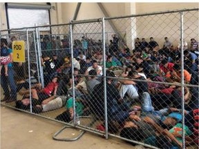 This image released in a report on July 02, 2019 by the US Department of Homeland Security (DHS) Inspector General Office (OIG) shows migrant families overcrowding a Border Patrol facility on June 10, 2019 in McAllen, texas.