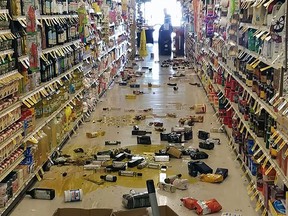 This handout picture obtained courtesy of Rex Emerson taken on July 4, 2019 shows broken bottles and other goods in a store in Lake Isabella, California after a 6.4 magnitude quake hit Southern California. A 7.1 quake hit souhtern California on Friday night, a day after this quake, according to the United States Geological Survey.