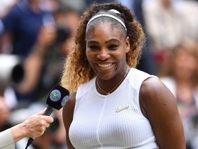 US player Serena Williams is interviewed during the presentation after losing against Romania's Simona Halep during their women's singles final on day twelve of the 2019 Wimbledon Championships at The All England Lawn Tennis Club in Wimbledon, southwest London, on July 13, 2019.