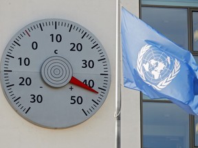 A huge thermometer mounted on a wall of the headquarters of the United Nations Framework Convention on Climate Change (UNFCCC) shows a temperature of 42 degrees Celsius in Bonn, Germany July 24, 2019.