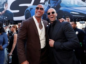 Dwayne Johnson (l) and Jason Statham arrive at the premiere for Fast & Furious Presents: Hobbs & Shaw in Los Angeles recently REUTERS/Mario Anzuoni/File Photo