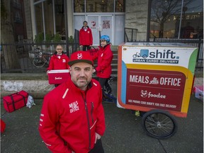 Ryan Spong (front) with Mariah Inkster (on trike), Eric Ly, (left) and Lee Dorner (background) in front of Foodee in Vancouver on Jan. 20, 2015. (Arlen Redekop/PNG FILES)