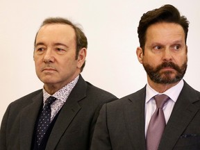 Actor Kevin Spacey, with his lawyer Alan Jackson at his side, is arraigned on a sexual assault charge at Nantucket District Court in Nantucket, Massachusetts, U.S., January 7, 2019. (Nicole Harnishfeger/Pool via REUTERS/File Photo)