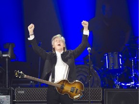 Paul McCartney gestures as he walks onstage during the Freshen Up tour at B.C. Place in Vancouver on Saturday, July 6, 2019.