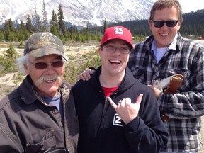 Drew Huskey holding up his wife's ring, with Syd Kanten, left, and Tyler Kanten. MUST CREDIT: Photo courtesy of Drew Huskey. For use only with MISSOURI-RING. For use only with MISSOURI-RING.