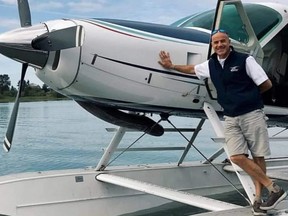 Pilot Al McBain died Friday when the Cessna 208 Caravan he was flying crashed crashed on Addenbroke Island. Three of the plane's eight passengers also died. Their names have not been released.