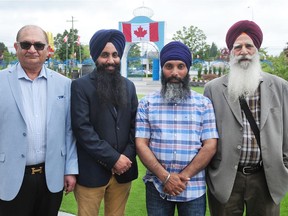 Satish Kumar, Gagan Singh, Hardeep Singh Nijjar and Jarnail Singh Aujla (left to right) at the Guru Nanak Temple in Surrey. The four are among seven South Asian leaders urging the provincial government to move quickly in approving a plan for a new Surrey police force. Photo: Nick Procaylo/Postmedia