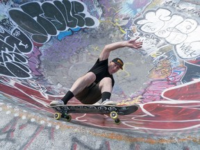 Steve "Slutty" Suttie does a trick while skating at the China Creek South skate park in Vancouver. Photo: Richard Lam/Postmedia