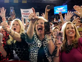 Supporters react as U.S. President Donald Trump holds a campaign rally in Greenville, North Carolina July 17, 2019.