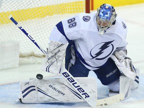 Tampa Bay Lightning goaltender Andrei Vasilevskiy stops Winnipeg Jets defenceman Ben Chiarot on a partial breakaway in Winnipeg on Sun., Dec. 16, 2018. (Kevin King/Winnipeg Sun)