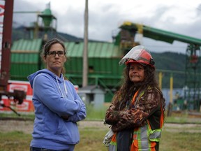 Madeleine deVooght (left), a planer tech, and Frances Johnson, an oiler, were longtime employees of the Canfor mill in Vavenby, which is being permanently closed.
