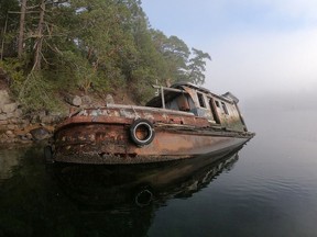 Salvage divers plan to pull the decaying Kwatna and Lulu Island trawlers out of Pender Harbour. One is now beached and the other has sunk. Photo courtesy of Freedom Diving Systems Ltd.