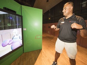 Faizzal Fatehali, manager of exhibit space for the PNE fair, said Game Changers explores the science behind video games while tapping into the magic of turning great stories into eye-popping pixels. The travelling educational exhibit, developed and produced by the Canada Science and Technology Museum, will be at the fair until Monday.