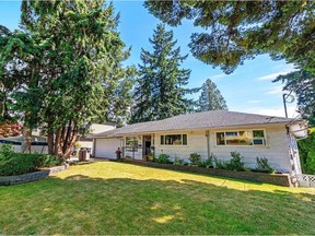 This home at 4150 Watling Street in Burnaby sold for $1,555,000. For Sold (Bought) in Westcoast Homes. [PNG Merlin Archive]