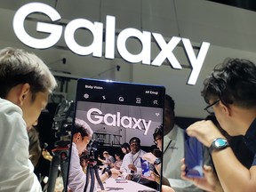 Crowds at the Barclay Centre in Brooklyn Wednesday lined up to have a first look at Samsung's newest flagship phones, the Galaxy Note 10 and the larger Note 10+.