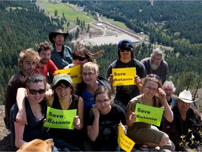 In this 2011 photo, Botanie Valley residents including Abe Kingston (at left rear, wearing hat) and Tricia Thorpe (centre, with blue top and glasses), were opposed to the plans of Surrey-based NorthWest Waste Solutions to import Lower Mainland organic waste to their "organic soil farm" (seen in background).