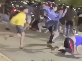 Surrey RCMP are investigating after a video was posted to Reddit on Sunday showing a messy parking lot brawl.