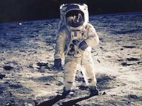 Apollo 11 astronaut Edwin 'Buzz' Aldrin standing on the moon, with fellow astronaut Neil Armstrong and their lunar module reflected in his helmet visor, during their historic first walk on the lunar surface in July 1969. Man last walked on the moon in December 1972, during the mission of Apollo 17.