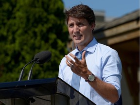 Prime Minister Justin Trudeau speaks about a watchdog's report that he breached ethics rules by trying to influence a corporate legal case, at the Niagara-on-the Lake Community Centre in Niagara-on-the-Lake last week.