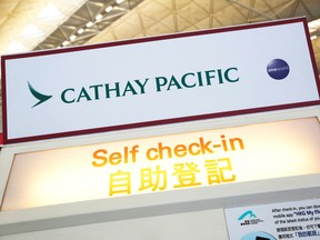 A Cathay Pacific self check-in machine is displayed at Hong Kong Airport in Hong Kong in 2018.