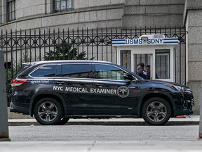 A medical examiner vehicle is seen at Metropolitan Correctional Center where financier Jeffrey Epstein was found dead in New York August 10, 2019.