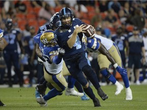 Toronto Argonauts quarterback McLeod Bethel-Thompson runs for a first down against the Winnipeg Blue Bombers during Thursday's CFL action at BMO Field in Toronto. The Argos won their first game of the season.