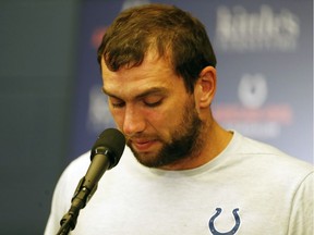 Indianapolis Colts quarterback Andrew Luck announces his retirement in a press conference after the game against the Chicago Bears at Lucas Oil Stadium on Saturday.