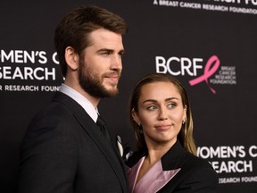Liam Hemsworth and Miley Cyrus attends The Women's Cancer Research Fund's An Unforgettable Evening Benefit Gala at the Beverly Wilshire Four Seasons Hotel on February 28, 2019 in Beverly Hills, California.