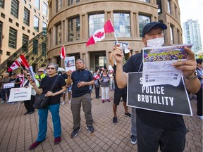 Hundreds of pro-democracy activists rallied in Vancouver on Saturday in solidarity with protesters in Hong Kong and across the globe.