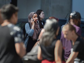 Statistics Canada said Canadian consumers paid less for telephone services in July following a industry-wide shift in how prices are set for cellular plans.