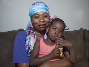 Josephine Erhabor with daughter Sarah, 3, at their Vancouver home July 26. Erhabor is a refugee from Nigeria and attended many literacy programs after arriving in Canada, and is helping Sarah, who is autistic, to get the help she needs.