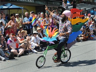VANCOUVER, BC., August 4, 2019 - Federal NDP leader Jagmeet Singh in action during the 2019 Vancouver Pride Parade in Vancouver,  BC., August 4, 2019.  (NICK PROCAYLO/PNG)   00058300A ORG XMIT: 00058300A [PNG Merlin Archive]