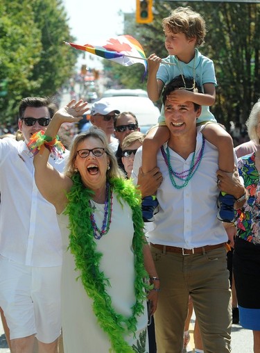 VANCOUVER, BC., August 4, 2019 -  Canadian Prime Minister Justin Trudeau with son, Hadrian and Elizabeth May marches in the 2019 Vancouver Pride Parade in Vancouver,  BC., August 4, 2019.  (NICK PROCAYLO/PNG)   00058300A ORG XMIT: 00058300A [PNG Merlin Archive]