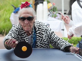 Mary Hatch plays in a ping pong tournament at Normanna Long Term Care Home in Burnaby.