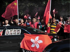 A rally outside the Chinese consulate in Vancouver to protest against "police brutality" against pro-Hong Kong supporters by police in Hong Kong as well as pro-China demonstrators.