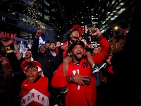 Raptors' fans celebrate on June 13, 2019 in Toronto.