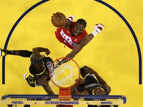 Kawhi Leonard #2 of the Toronto Raptors attempts a shot against the Golden State Warriors during Game Six of the 2019 NBA Finals at Oracle Arena on June 13, 2019 in Oakland, California.