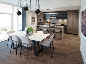 The kitchen in the MODE penthouse display suite features dual-tone cabinetry, while waterfall edges on the island add a touch of luxury.