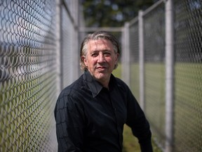 Former Hells Angels member Joe Calendino poses for a photograph at L.A. Matheson Secondary School where he facilitates an after-school program for students, in Surrey, B.C., on Tuesday June 4, 2019.