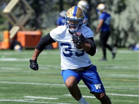 Running back Andrew Harris cuts with the ball during Winnipeg Blue Bombers practice on the University of Manitoba campus, last Monday.